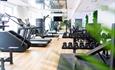 Weights, step machine and treadmills inside The Barnstaple Hotel gym