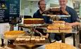 team of Johns of Instow behind the counter filled with cakes