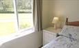 Spreacombe Gardens bedroom with garden view self catering cottages